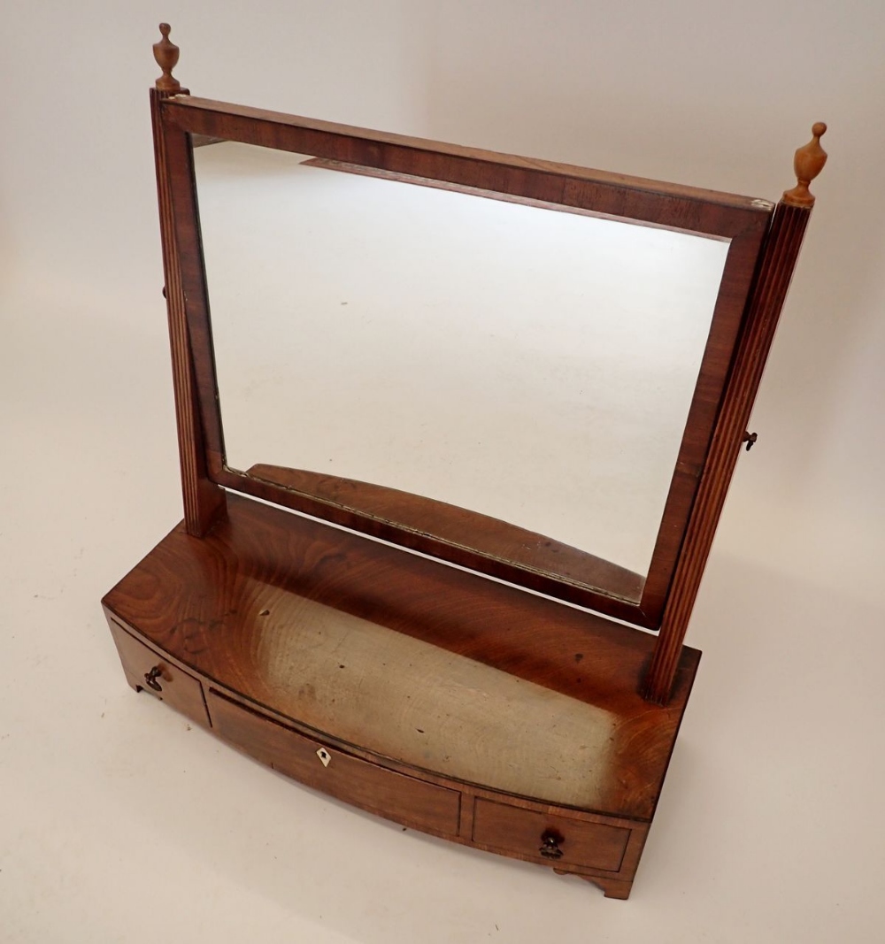 An Edwardian rectangular mahogany swing toiletry mirror with box base, 54cm wide