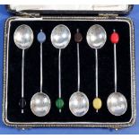 A set of six silver coffee bean spoons - cased, Birmingham 1932