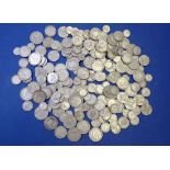 A quantity of silver content British coinage pre 1947 including: sixpences, shillings, two