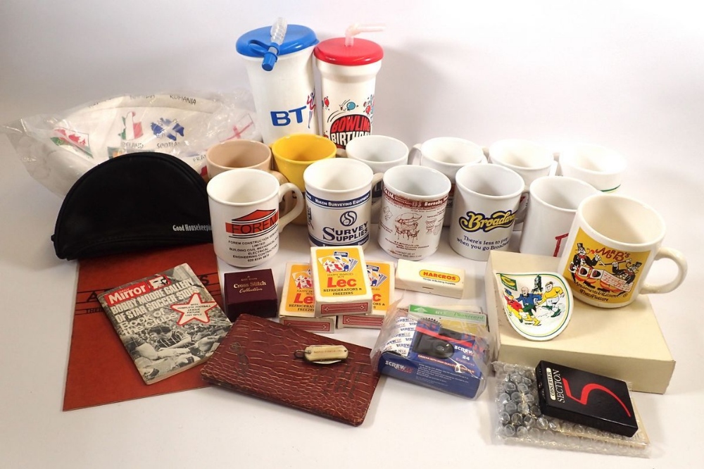 A box of general advertising and promotional items including inflatable pop stars