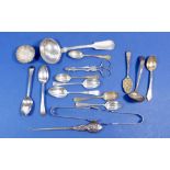 Assorted silver cutlery including silver sauce ladle, sugar nips etc. 318g