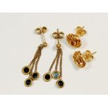 A pair of 9 carat gold and sapphire pendant earrings and a pair of 9 carat gold knot earrings, total