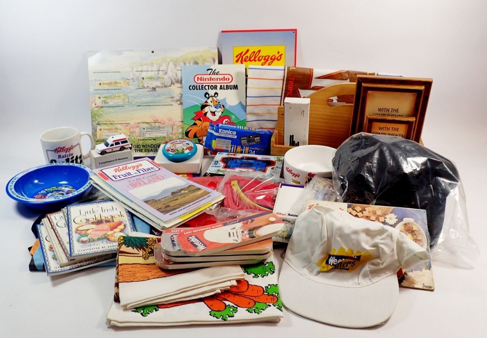 A box of advertising and promotional items relating to breakfast cereals such as Kellogs etc