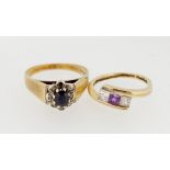 A 9 carat crossover ring set amethyst and white stones, size H and a 9 carat gold sapphire cluster