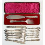 A pair of Victorian silver plated fish servers, cased and a set of six silver plated fish knives and