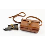An F Barker & Sons London, Inclinometer, MK IV No. 603011917, in leather case
