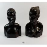 Two African carved tribal busts, 26cm tall