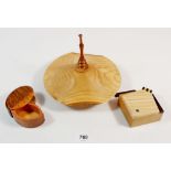 A treen puzzle box and two other treen items