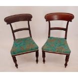 A pair of William IV mahogany dining chairs on turned and reeded supports