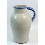 A tall blue rimmed and handled Bourne Denby jug, 28cm tall