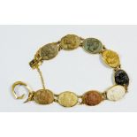A 19th century Italian lava bracelet carved cameos, with yellow metal mounts, the clasp and final