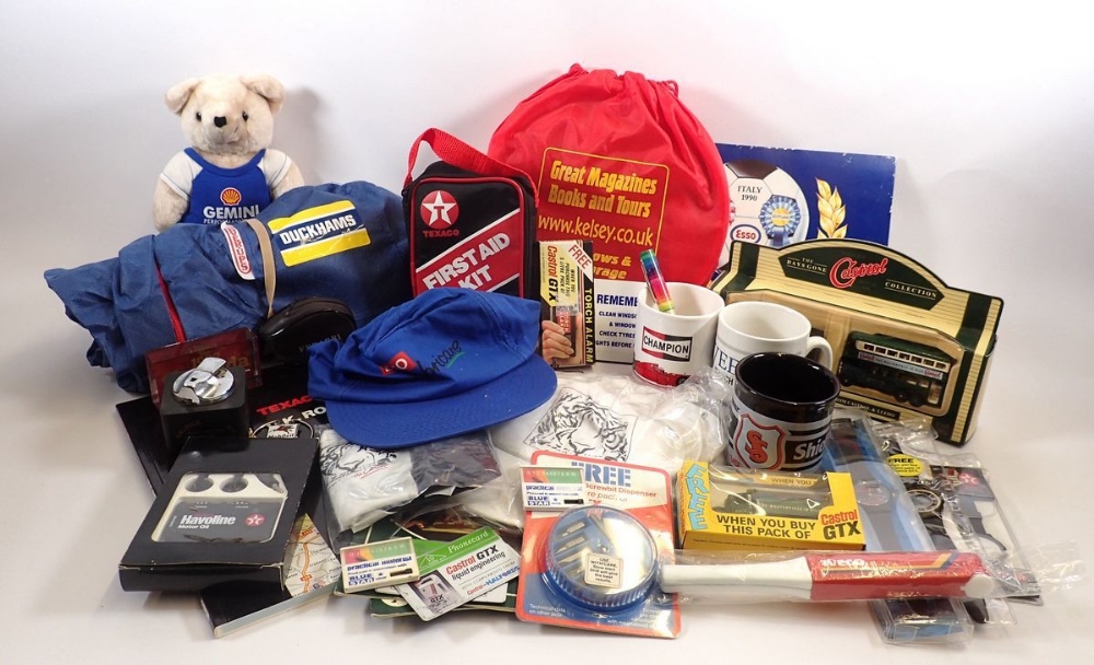 A box of advertising and promotional items relating to oil companies, and motoring including Esso