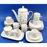 A Swedish Hackefors coffee set comprising: coffee pot, six cups and saucers, six tea plates, milk,