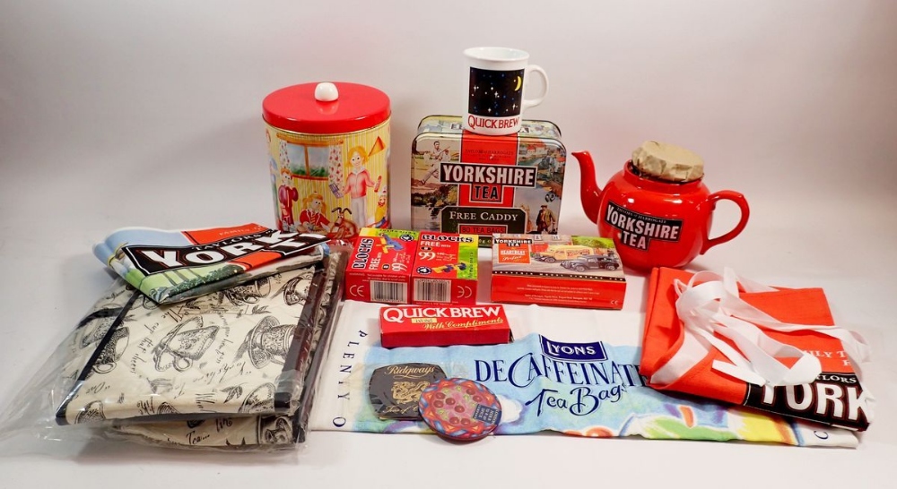 A box of advertising and promotional items relating to Quick Brew tea and Yorkshire tea