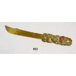 A Japanese Meiji period brass and copper paperknife with bird and flower handle