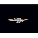 A 14 carat gold solitaire diamond ring, Size L to M