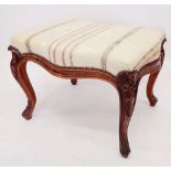 A Victorian mahogany framed stool with carved decoration and cabriole supports