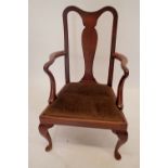 An early 20th century Queen Anne style carver chair