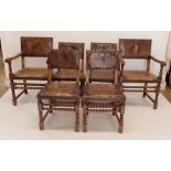 A set of six oak framed Puritan style dining chairs with leather seat and back (four diners and