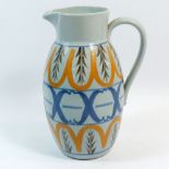 A Buchan Stoneware jug with blue and yellow decoration, 25.5cm tall