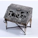 A miniature Dutch silver bureau with import hallmarks for London 1900, 6cm tall