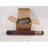 A Henley gas mask, boxed and a W Ottaway and Co Ltd WWII telescope dated 1945, No. 8044