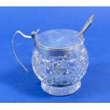 A cut glass preserve pot with silver lid and key, Birmingham 1935 and matched silver spoon