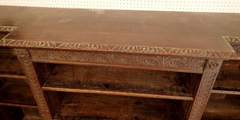 A 19th century dwarf oak breakfront bookcase with all over floral carved decoration and pilasters to - Image 4 of 4