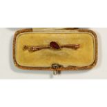 A Victorian 9 carat gold amethyst set bar brooch, boxed