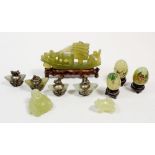 A group of Chinese 'jade' items including boat group and white metal mounted animal counters