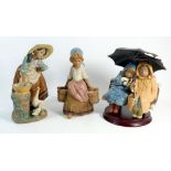 A Lladro group boy and girl under umbrella - umbrella a/f, limited edition, plus Lladro washer woman