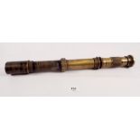 A 19th century brass telescopic gun sight lens