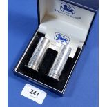 A sterling silver salt and pepper in the form of shot gun cartridges, cased, 5.7cm tall, Sheffield