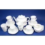 A Shelley Dainty tea service comprising: teapot (spout a/f), eight cups and saucers and two extra