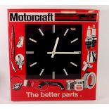 A Motorcraft advertising red plastic wall clock 38 x 40cm x 4.5cm