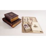 Two Victorian leather bound photograph card albums both empty together with a selection of loose