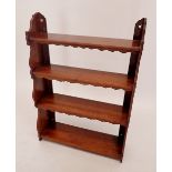 A set of 19th century fruitwood hanging shelves with shaped side panels, 61cm wide x 88cm high