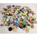 A quantity of advertising and promotional badges including motor vehicles, Atari and Disney etc