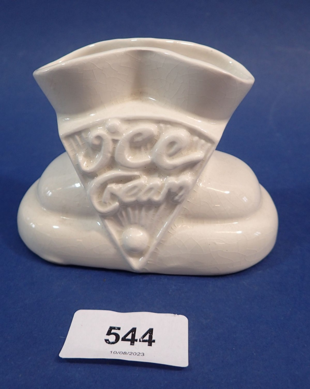 A vintage pottery 'Ice Cream' cone holder