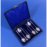 A set of six silver teaspoons with spiral stems - cased, Birmingham 1910