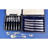 A set of six silver cake forks, Sheffield 1932 cased, five tea knives plus three spoons and a cake