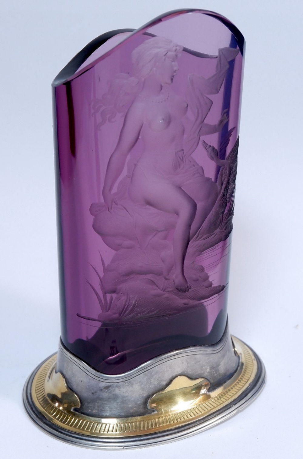 A fine quality amethyst glass oval vase with cameo cut scene of Leda & The Swan, mounted by