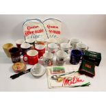 A box of advertising and promotional items relating to coffee and hot drinks including Horlicks,