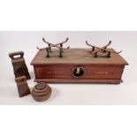 A pair of W & T Avery mahogany scales, marked Birmingham and various weights, 36cm wide