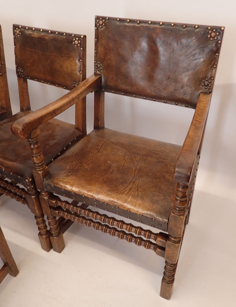 A set of six oak framed Puritan style dining chairs with leather seat and back (four diners and - Image 4 of 4