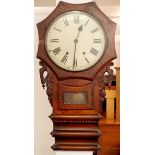 A Victorian walnut wall clock with inlaid and carved decoration