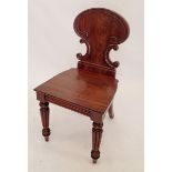 A Victorian mahogany shield back hall chair