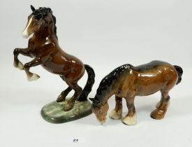 A Beswick rearing horse and a shire horse