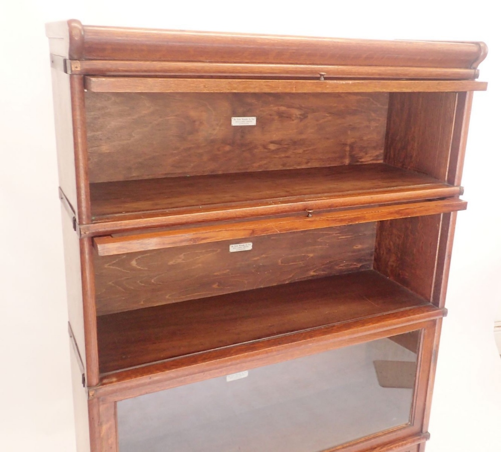 A Globe Wernicke oak four section bookcase - Image 2 of 4