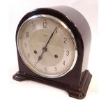 An Enfield Bakelite clock, 22 x 21cm